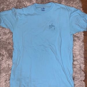 Blue guy Harvey shirt